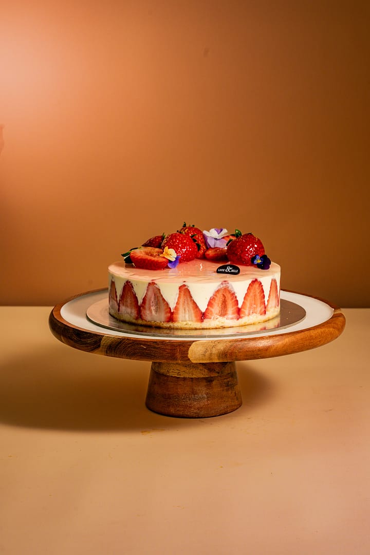 Fraisier French Fraisier cake with fresh strawberries and vanilla cream.